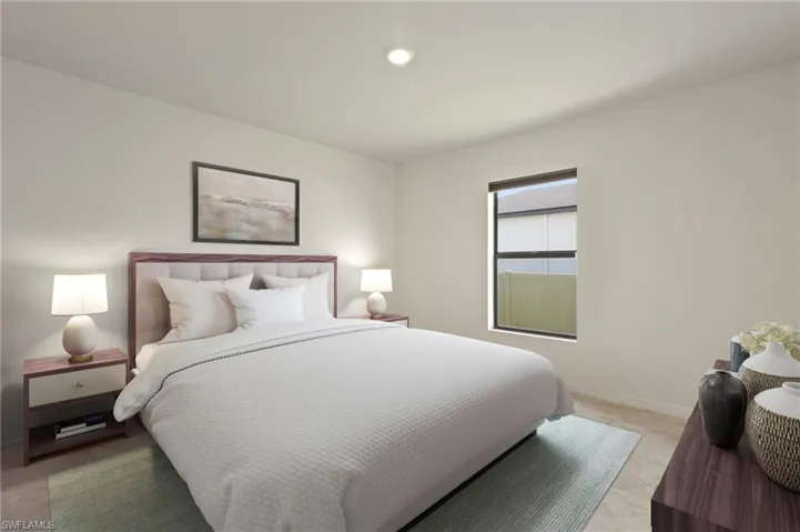 Bedroom with baseboards and recessed lighting