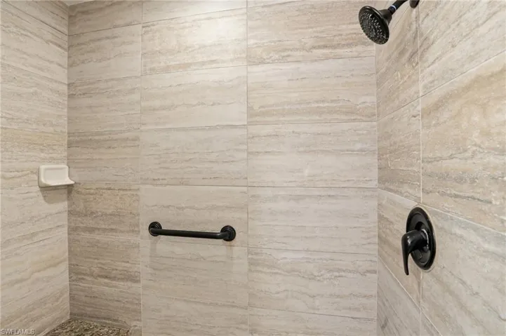 Bathroom view of a large tiled shower