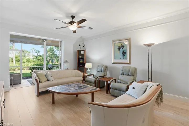 Living area with LVP flooring and quality furnishings