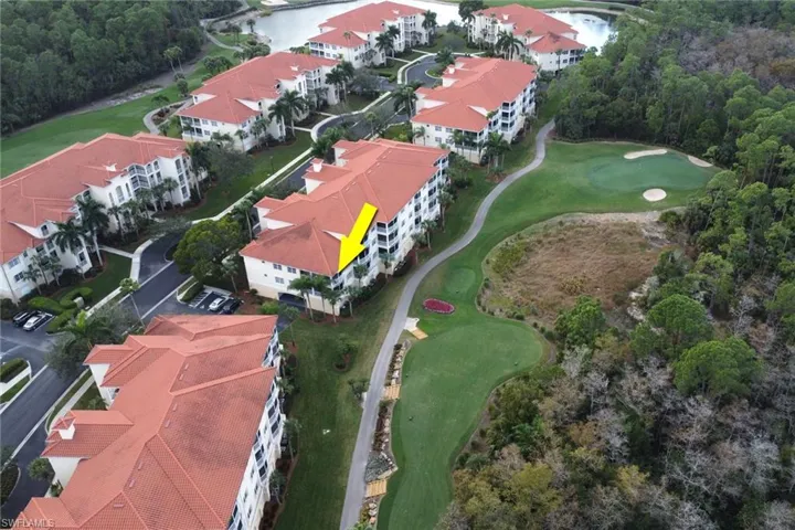 Aerial view of Condo, golf course and preserve