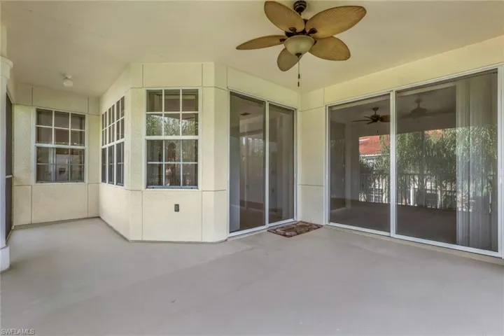 View of patio featuring a ceiling fan