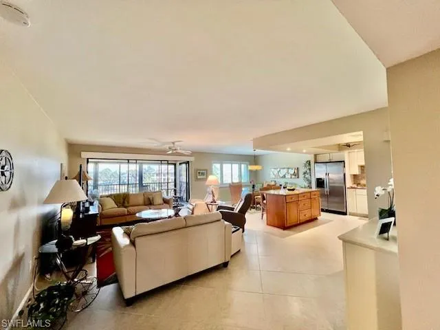 Living room featuring ceiling fan