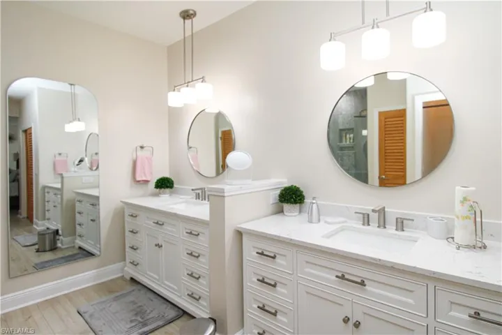 Bathroom featuring vanity and hardwood / wood-style flooring