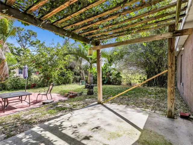 View of patio with a pergola