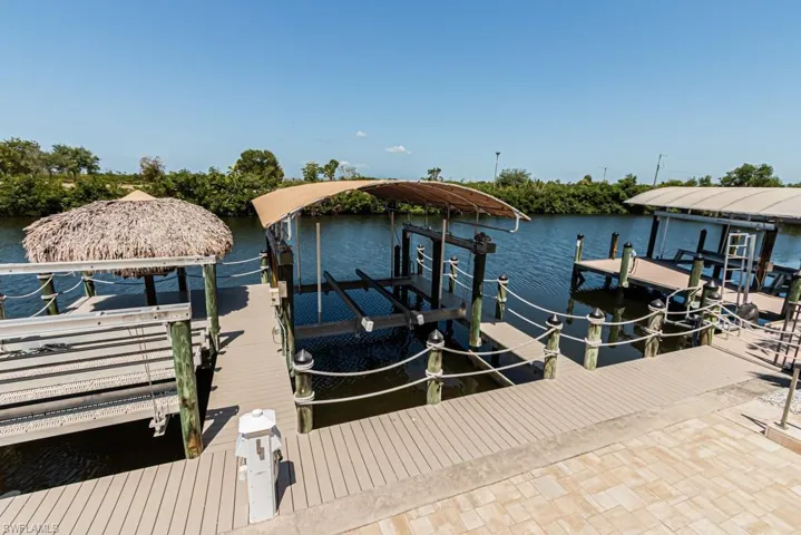 20,000lb boat lift, jet ski lift and Tiki hut