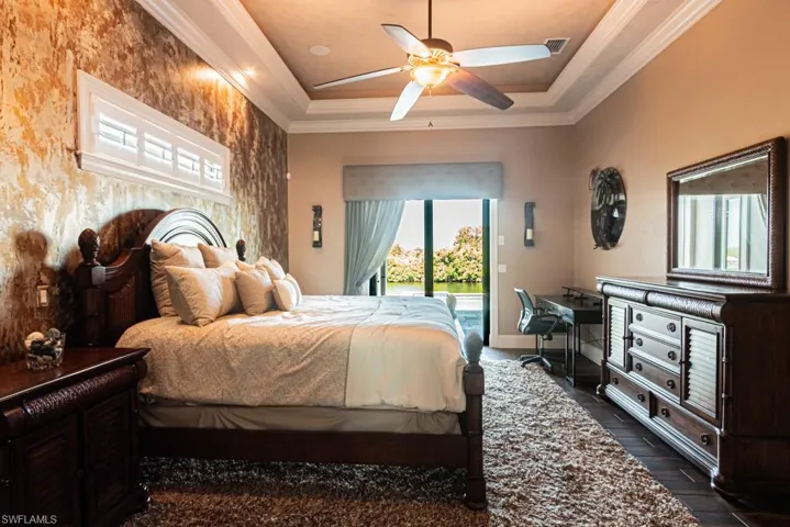 Main bedroom with sliders to the lanai