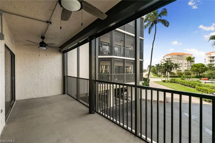 Balcony featuring ceiling fan