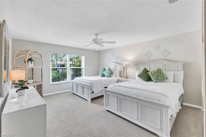 A generously sized second bedroom offering plenty of space for guests, family, or a home office.