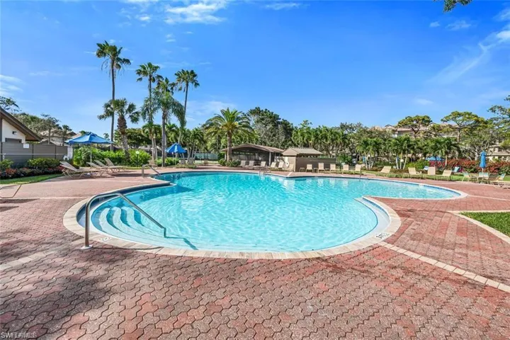 A resort-style pool within Wedgewood at Bonita Bay offers a relaxing, vacation-like setting just steps from home.