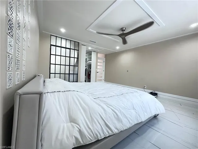 Bedroom featuring recessed lighting and a ceiling fan
