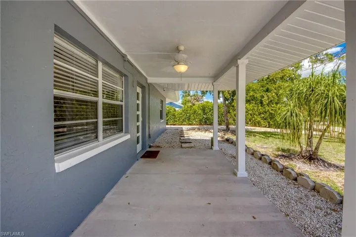 View of patio with ceiling fan