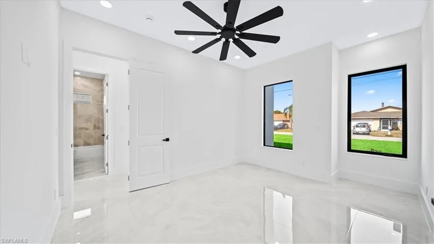 Unfurnished room featuring recessed lighting and ceiling fan