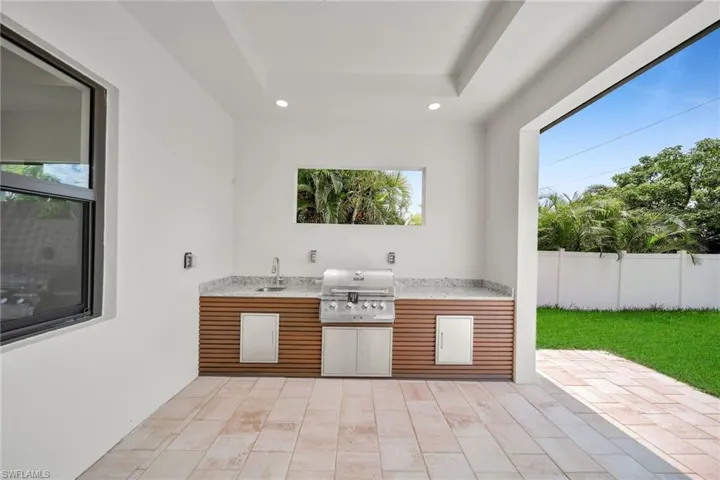View of patio / terrace featuring sink and grilling area