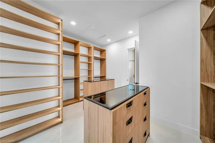 Walk in closet featuring light tile patterned floors
