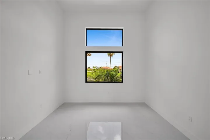 Empty room with tile patterned floors