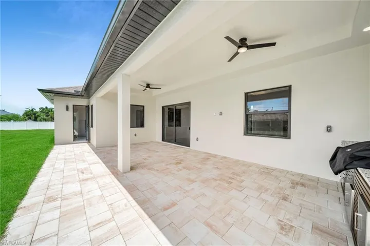 View of patio with ceiling fan