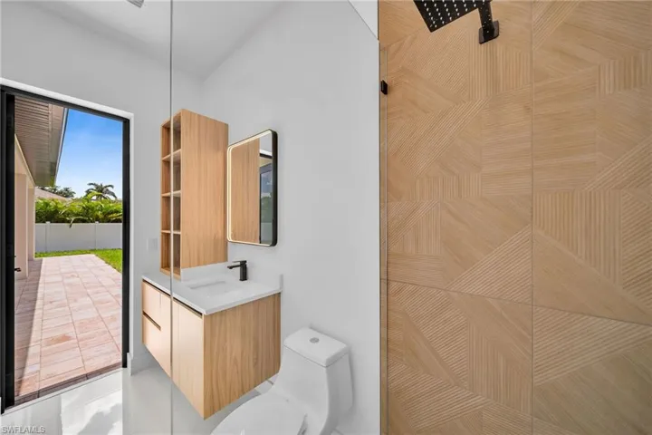 Bathroom with vanity and toilet