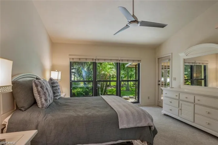 Bedroom featuring carpet floors and a ceiling fan