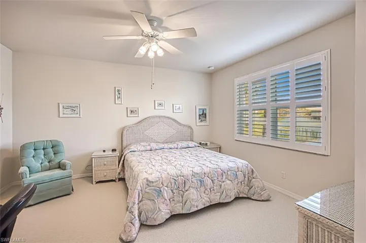 Bedroom with carpet floors and ceiling fan