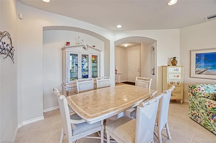 Dining room featuring light tile patterned floors