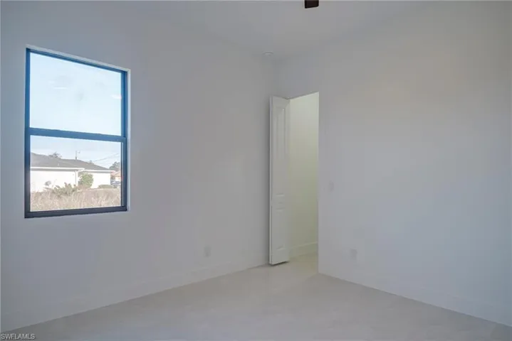 Empty room with baseboards