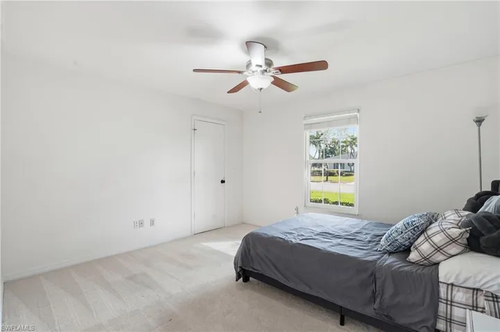 Bedroom with carpet floors and ceiling fan