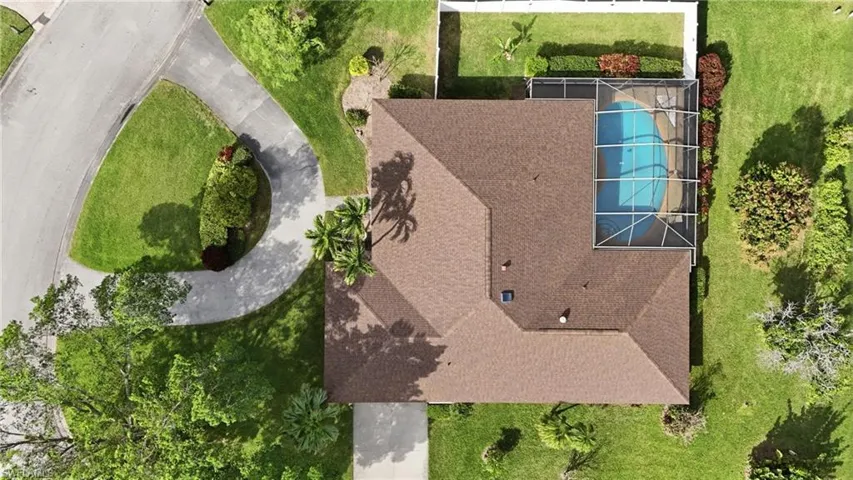 View from above of property featuring a pool area