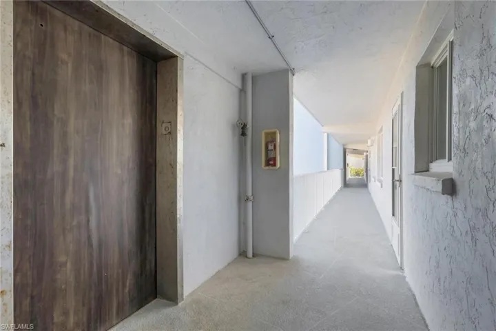 Corridor featuring elevator