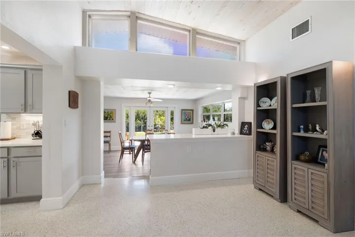 vaulted ceiling entry to kitchen and DR