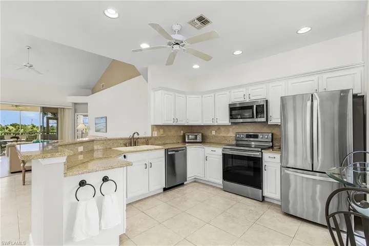 Kitchen with stainless steel appliances and granite countertops
