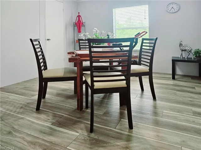 Dining room with light wood-type flooring