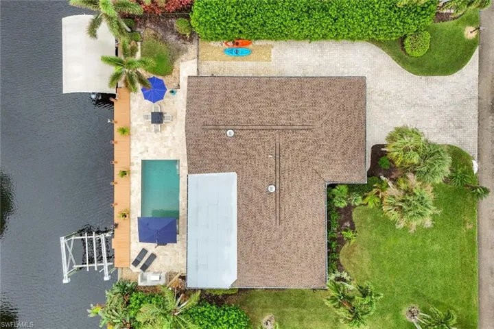 Aerial view of the home. Notice the extended driveway.