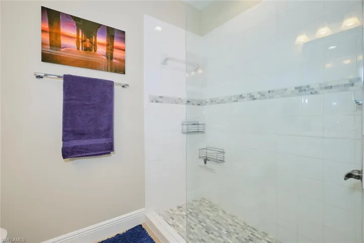 Bathroom with tiled shower