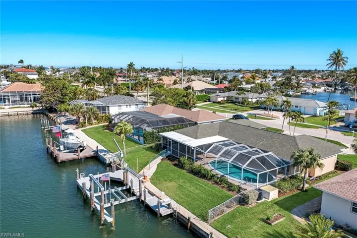 Aerial view of residential area with a large body of water