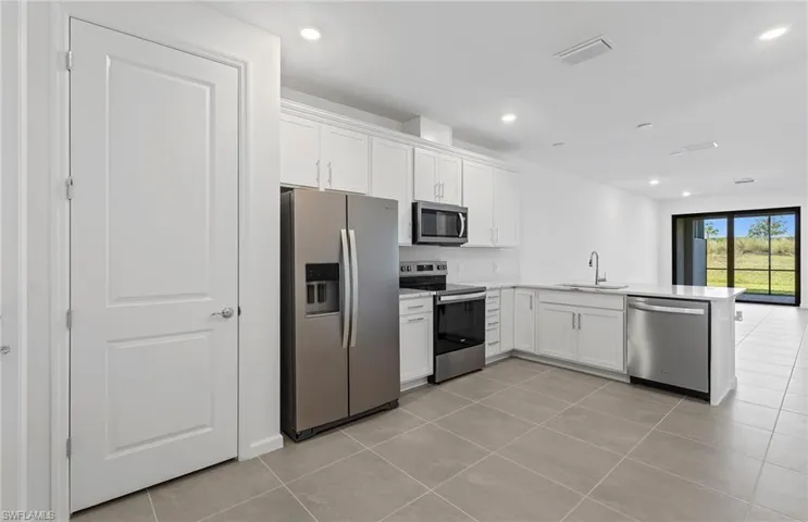 Photo depicts the actual home available for sale.