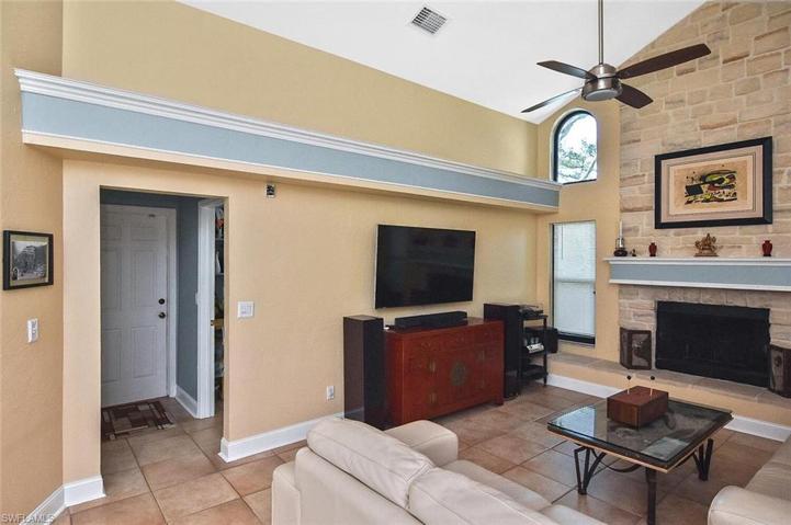 Main living room with entry to laundry and garage