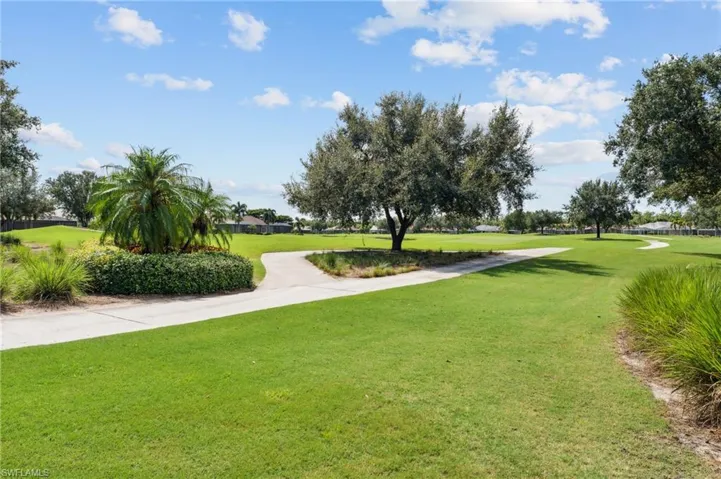 View of home's community featuring a lawn