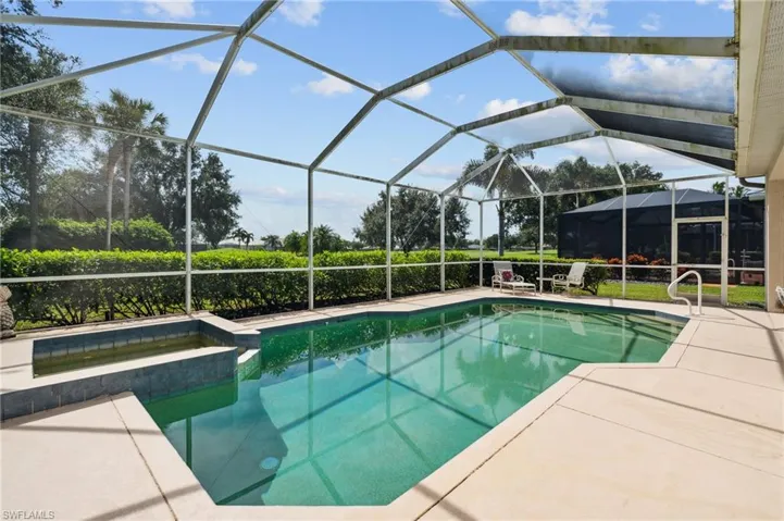 View of pool featuring a lanai and a patio area