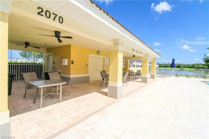 View of patio with ceiling fan