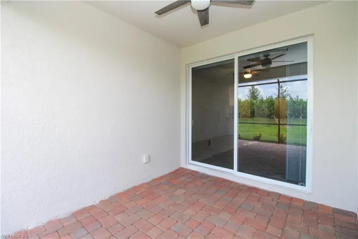 View of patio / terrace featuring ceiling fan