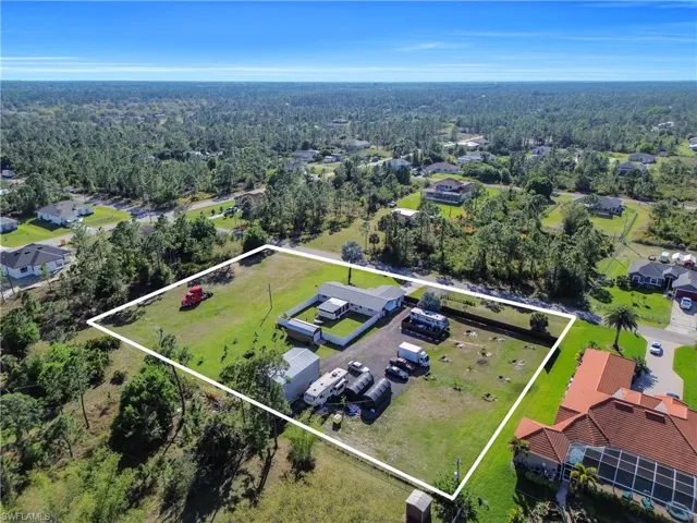 Bird's eye view with a wooded view