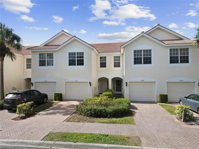 View of front of property with a tiled