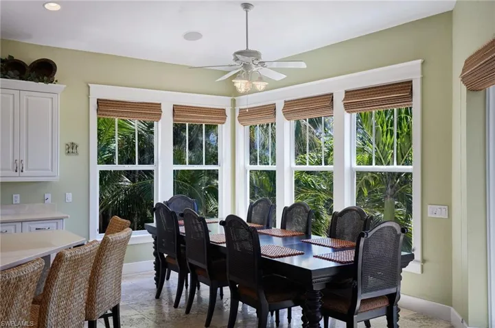 Dining space featuring recessed lighting, a ceiling fan, and baseboards