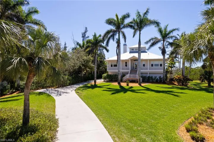 Long concrete driveway with extra parking