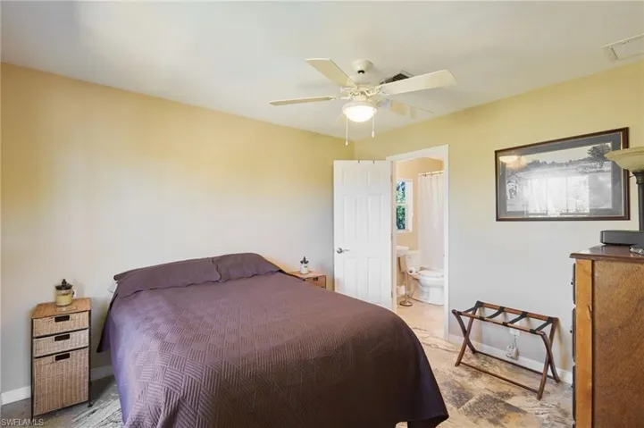 Bedroom looking into full bath