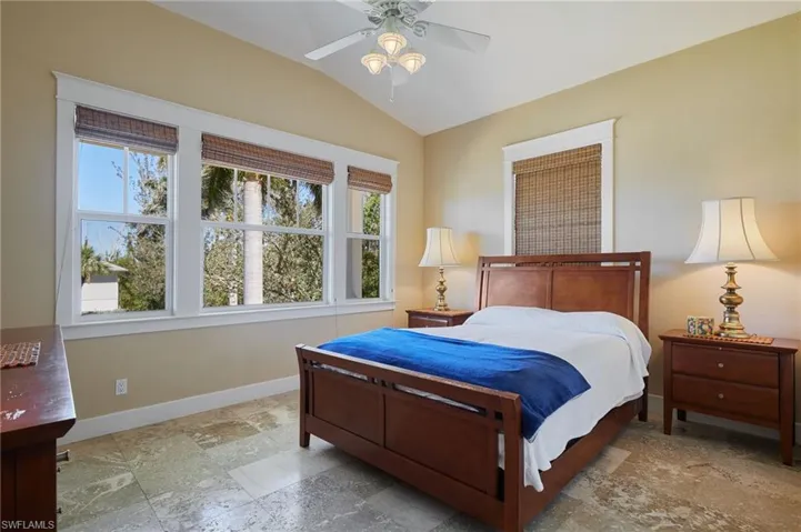 Bedroom #3 with several windows and large walk-in closet.