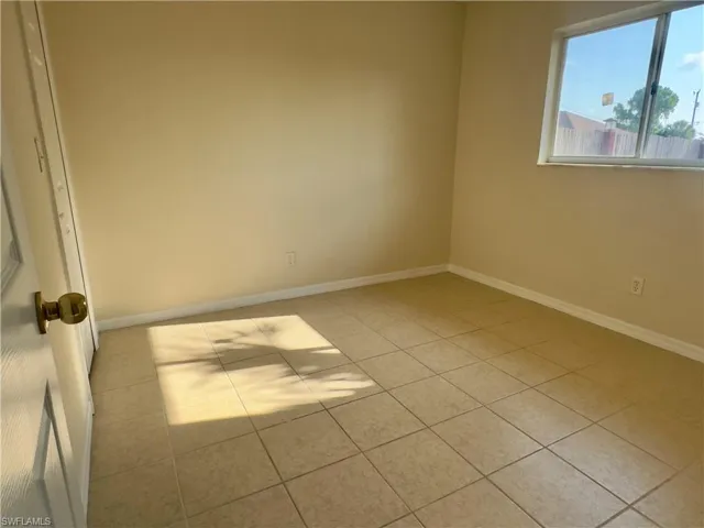 View of tiled spare room