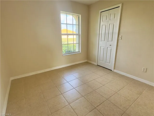 View of tiled empty room