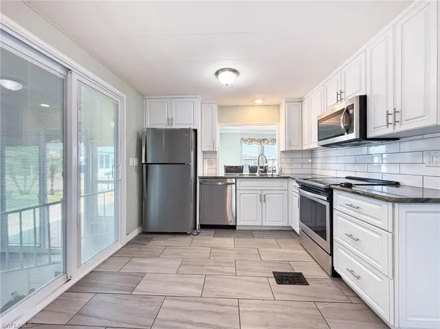 Cornerstone Kitchen Cabinets with Granite counters - Stainless Steel Appliances