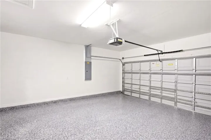 2 car garage with epoxy flooring (laundry tub not pictured)